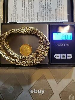 14k gold chain + 22k gold coin