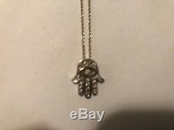 18K Roberto Coin Hamsa necklace retails for $1040