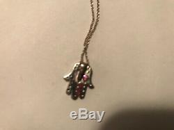 18K Roberto Coin Hamsa necklace retails for $1040