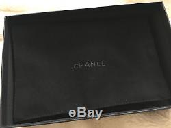 NEW CHANEL classic coin purse, black with gold logo. Never used, in box