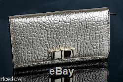 NWT Burberry Heritage Grain Large Light Gold Metal Bow Penrose Zip Wallet $575