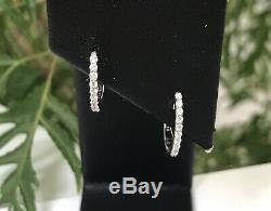 New Authentic Roberto Coin 18kt white gold baby diamond 0.20 ct hoop earrings