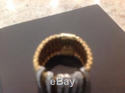 ROBERTO COIN 18k yellow gold woven band ring with diamond accents set in