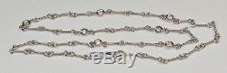 Roberto Coin 18K Gold 7 Diamond Station Necklace Dog Bone Twist Chain