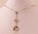 Roberto Coin 18k Gold Diamond Entwined Circle Drop Lariat Necklace Pendant